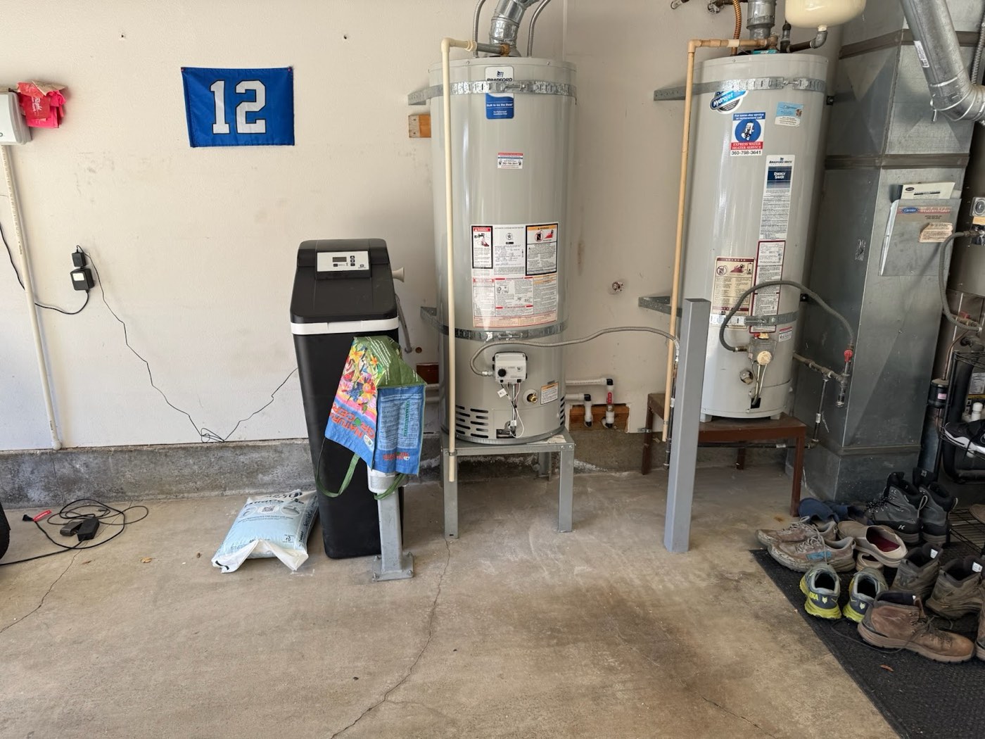 Gas tank water heaters and a water softener in a Vancouver, WA garage